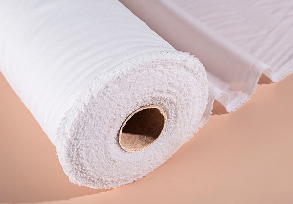 White lightweight woven fusible interfacing roll